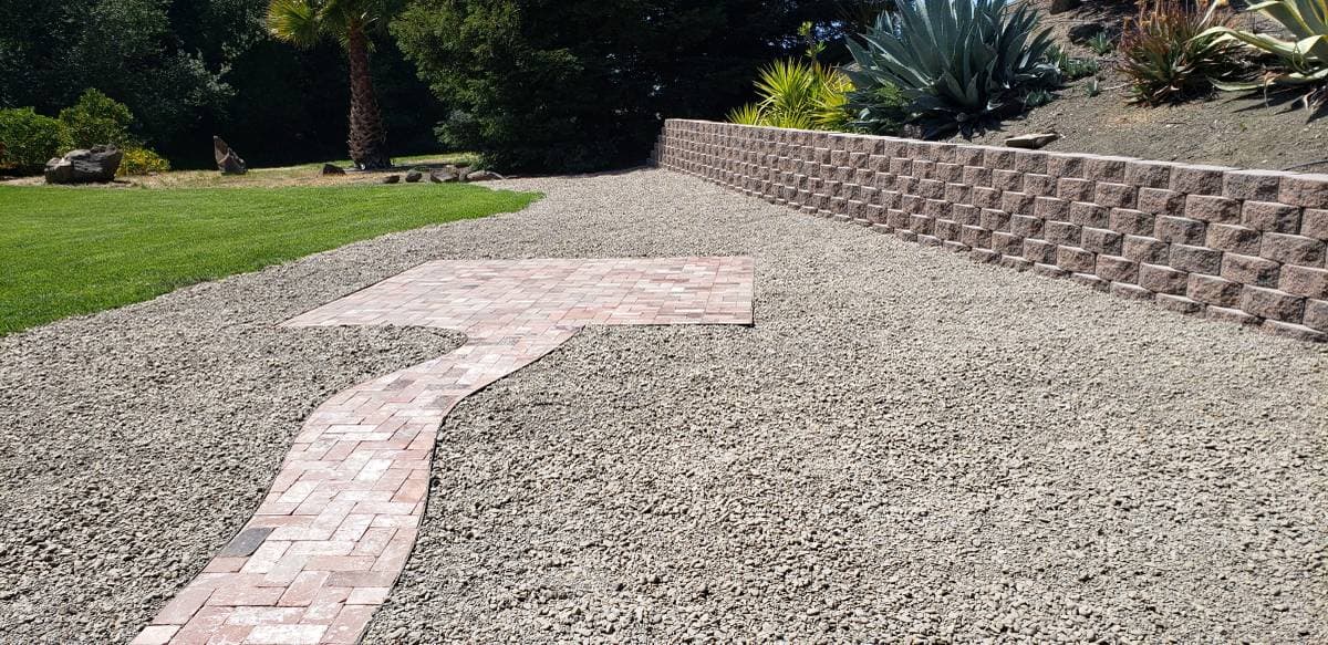 Picture of a paver walkway in a backyard